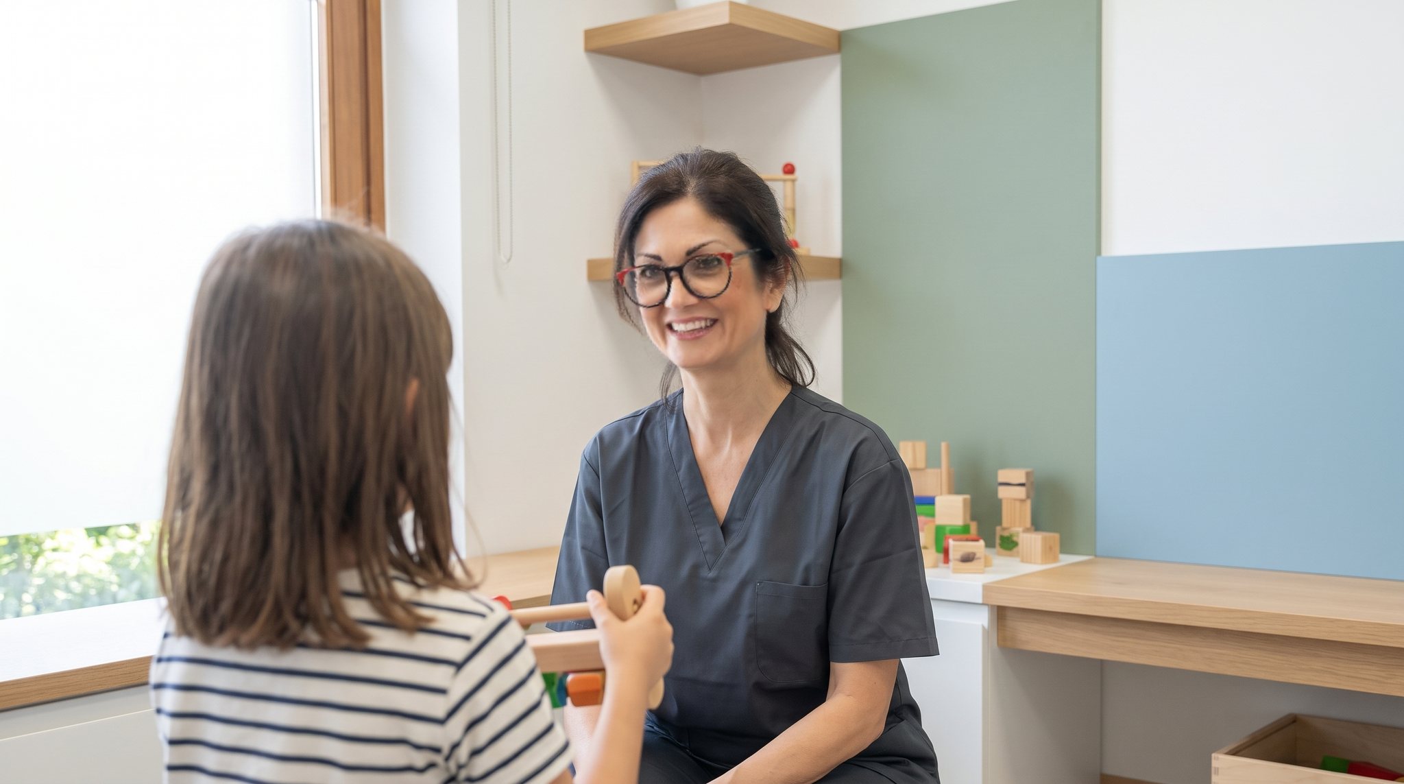 Dentista per bambini a Pistoia: la sala d'attesa con l'angolo per i piccoli nello studio in cui riceve la Dott.ssa Erika Schioppa